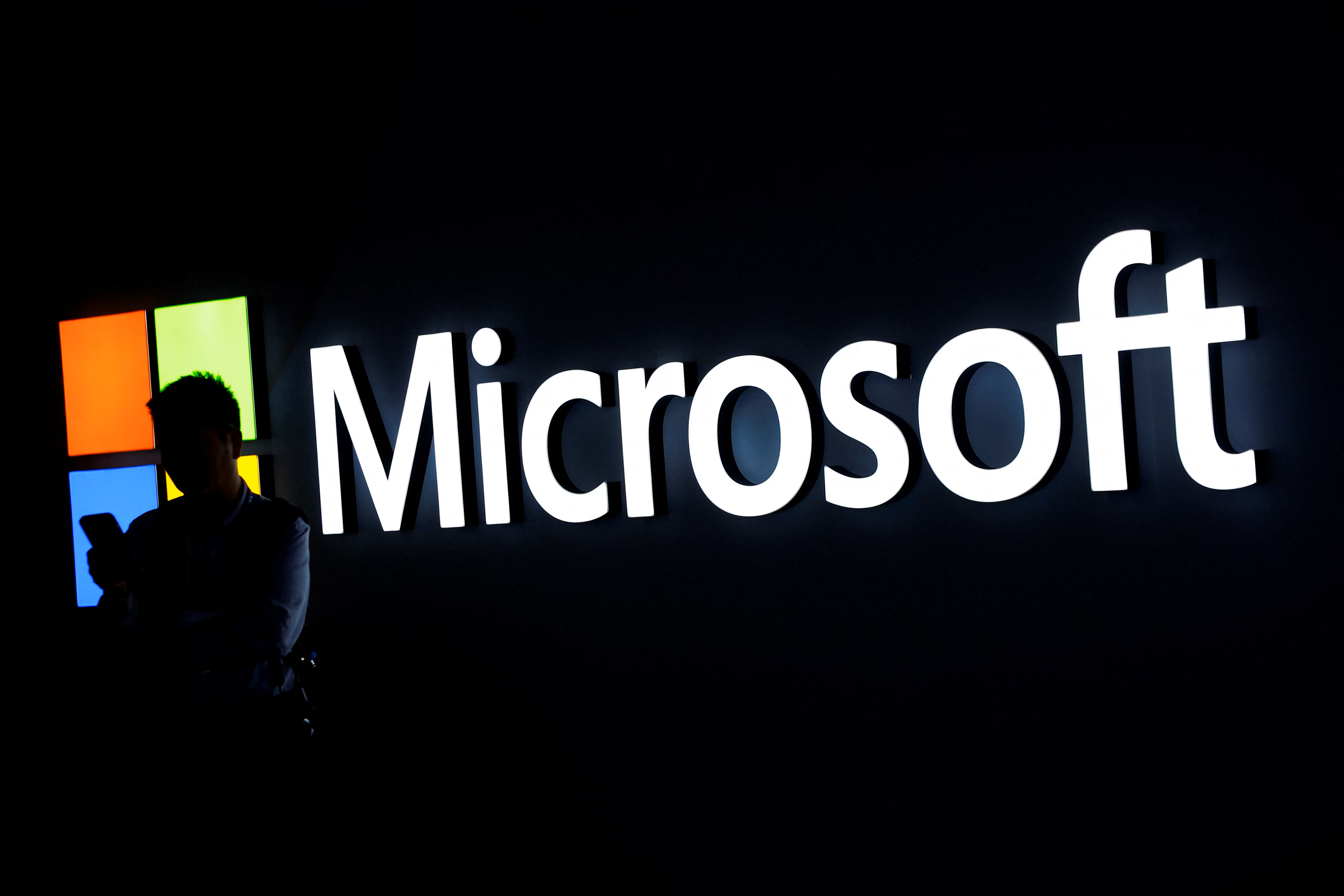 Microsoft Hits  Trillion Valuation as Apple Reports Record iPhone Sales